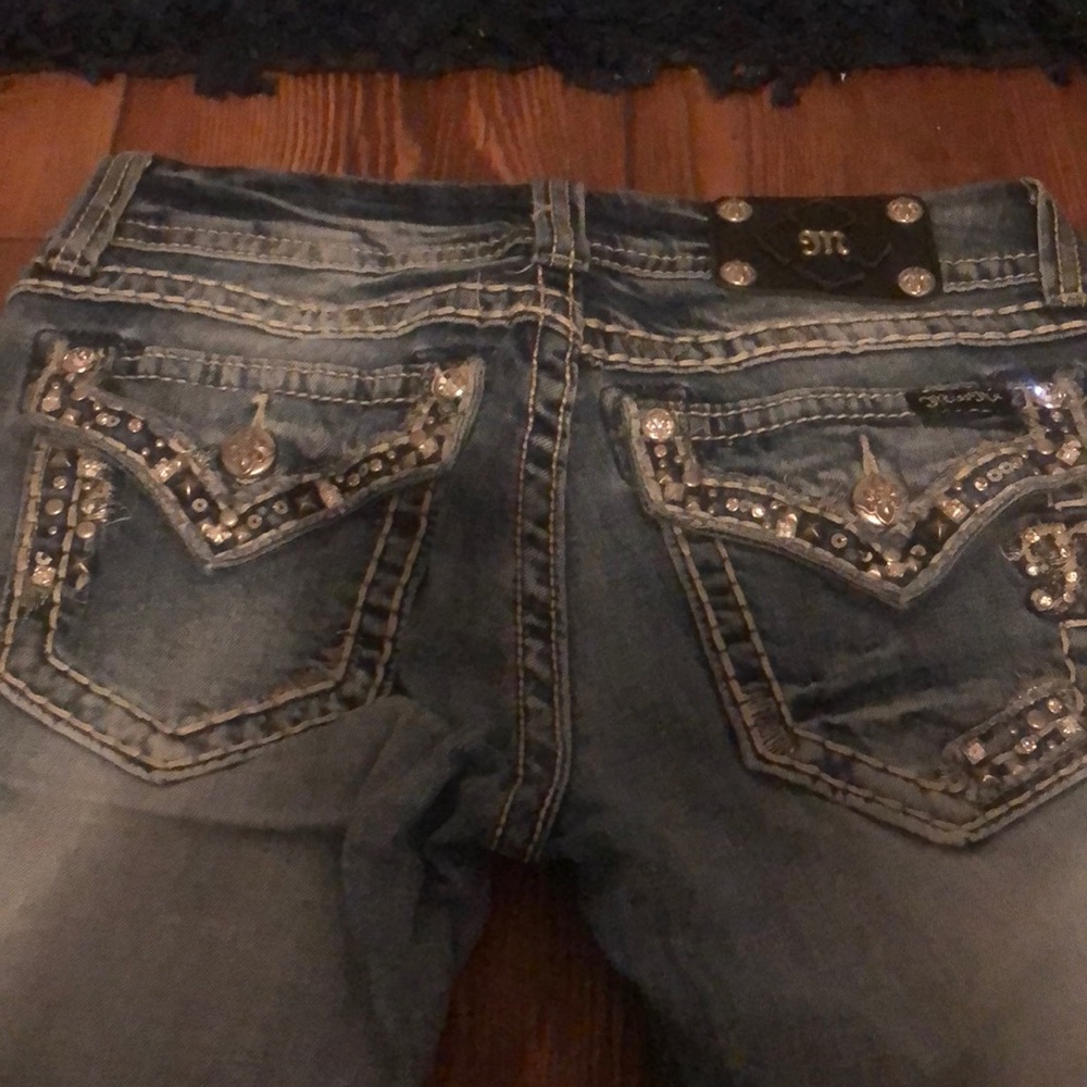 Miss Me Straight medium wash size 27 inseam 31.